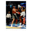 Signed boxing photo of Anthony Joshua landing an uppercut on Wladimir Klitschko during their heavyweight fight.