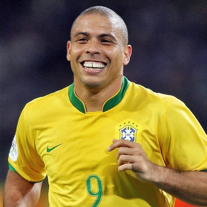 Ronaldo de Lima wearing a Brazil football shirt number 9 during an international football match.