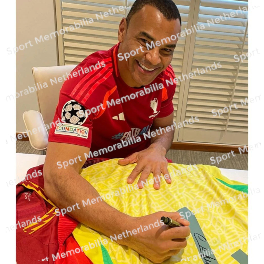 Signing proof of Cafu signing an official Brazil 2024 football shirt during a private signing session.
