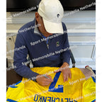 Signing proof of Andriy Shevchenko signing an official Ukraine 2026-27 football shirt during a private signing session.