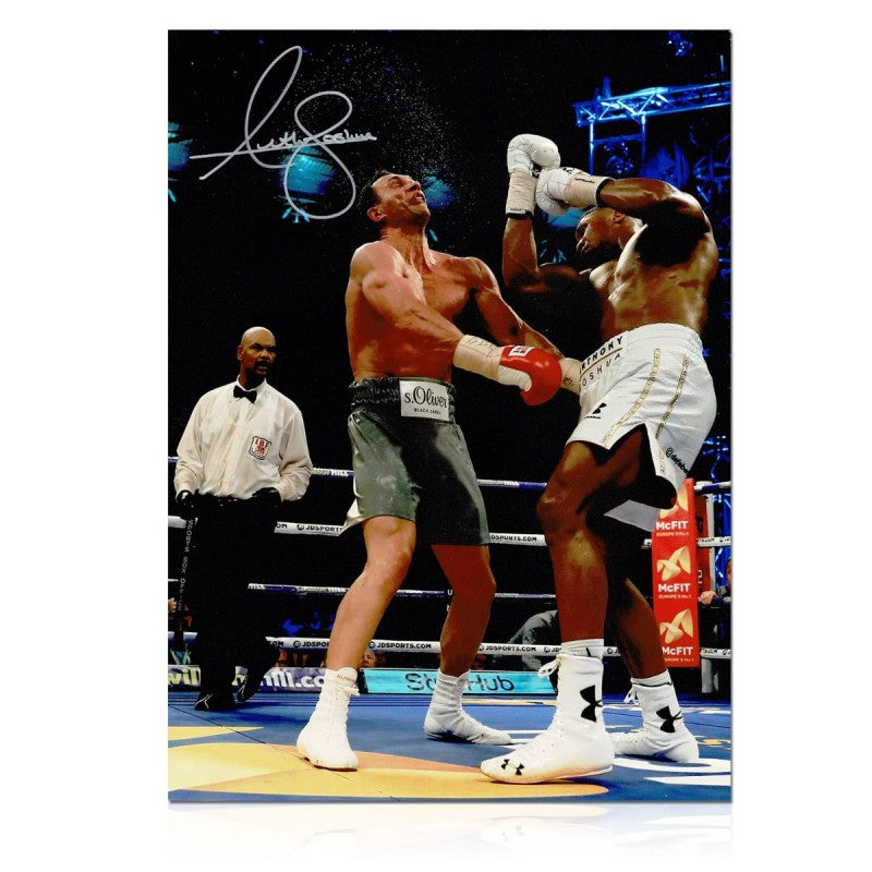Signed boxing photo of Anthony Joshua landing an uppercut on Wladimir Klitschko during their heavyweight fight. Main image