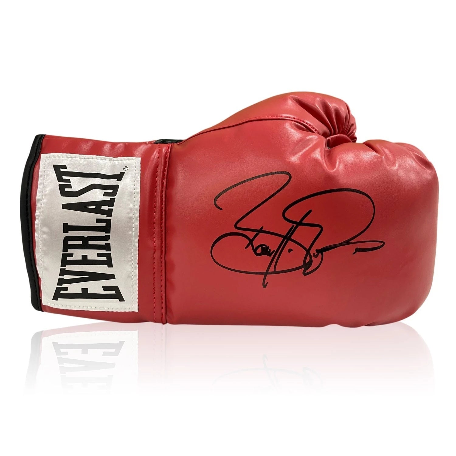 Red Everlast boxing glove signed by Barry McGuigan with black signature.