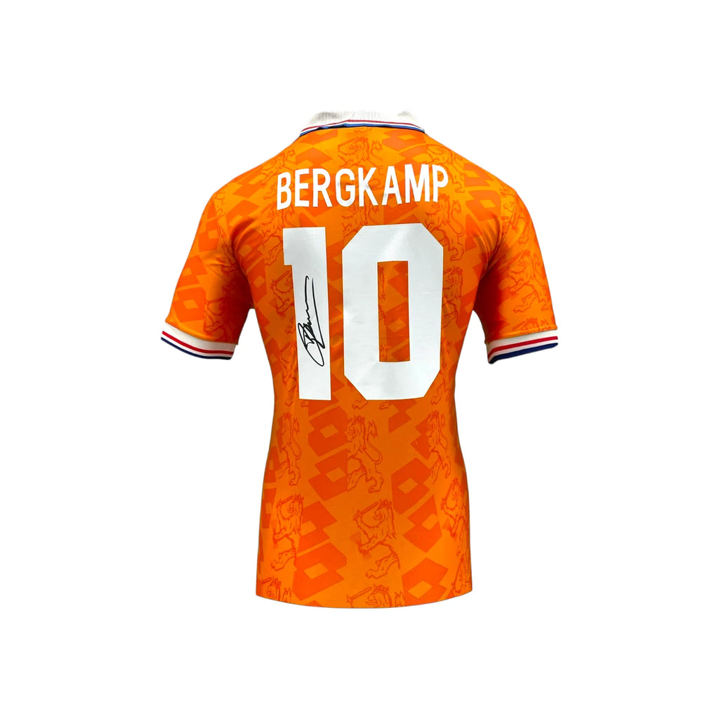 Official replica Holland 1994 home football shirt signed by Dennis Bergkamp.