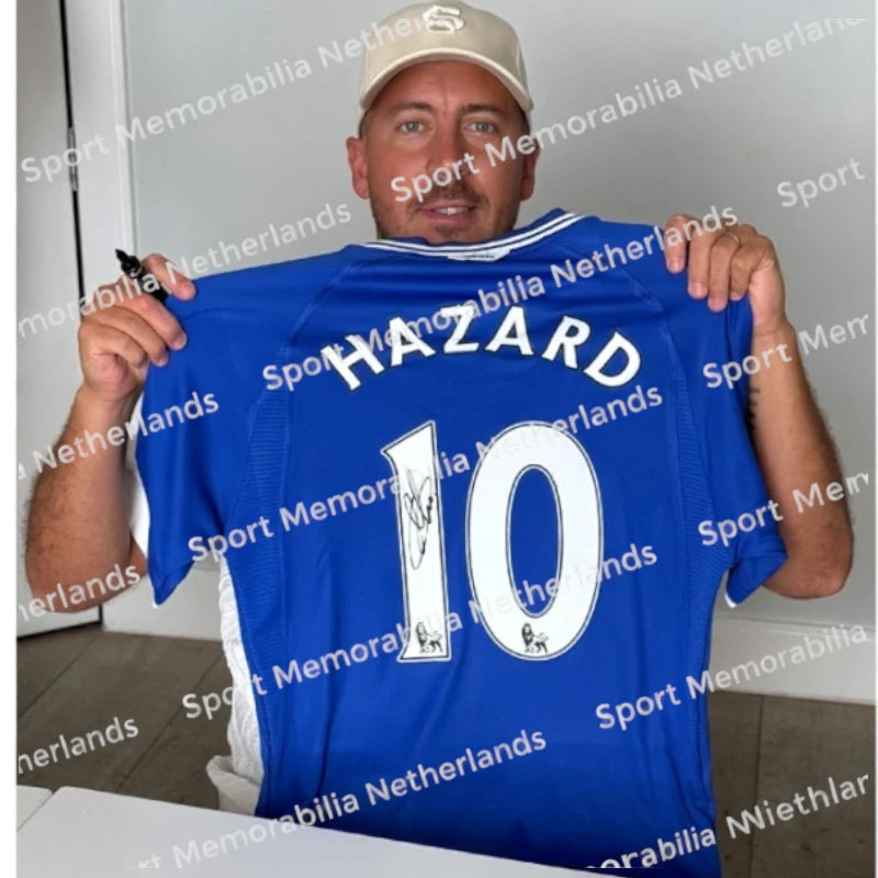 Signing proof of Eden Hazard with a signed Chelsea 2000 football shirt during a private signing session.