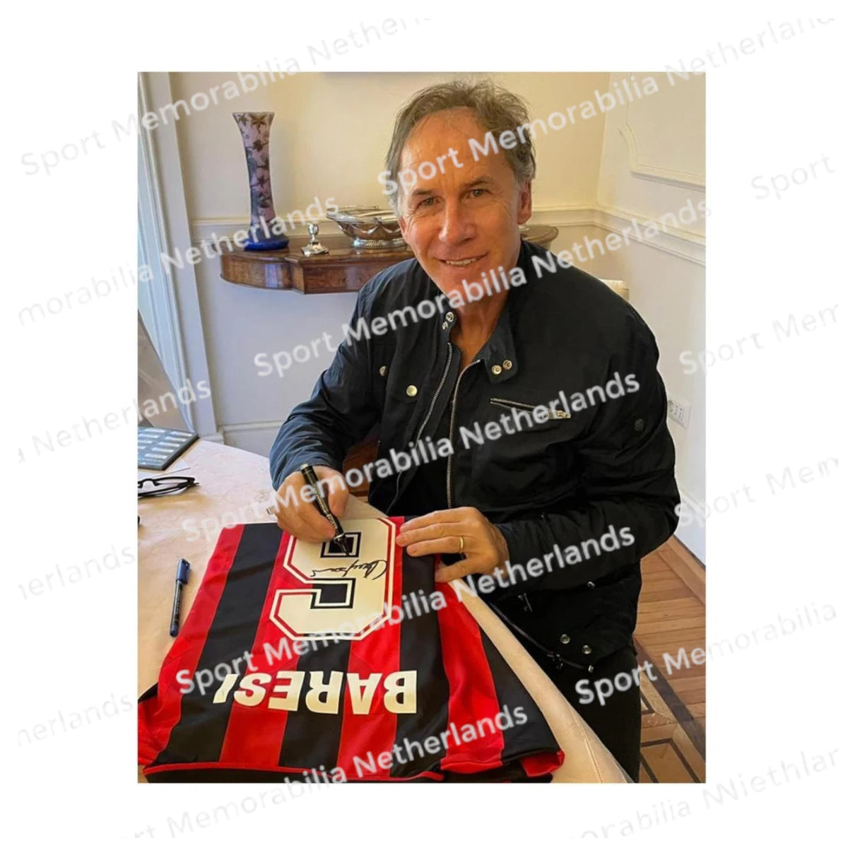 Signing proof of Franco Baresi signing an official AC Milan 1994 football shirt during a private signing session.