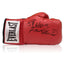 Red Everlast boxing glove signed by Frank Bruno with black signature and Know What I Mean inscription.
