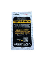 JSA-certificaat van echtheid voor het door Hulk Hogan gesigneerde gele Hulkamania-shirt.