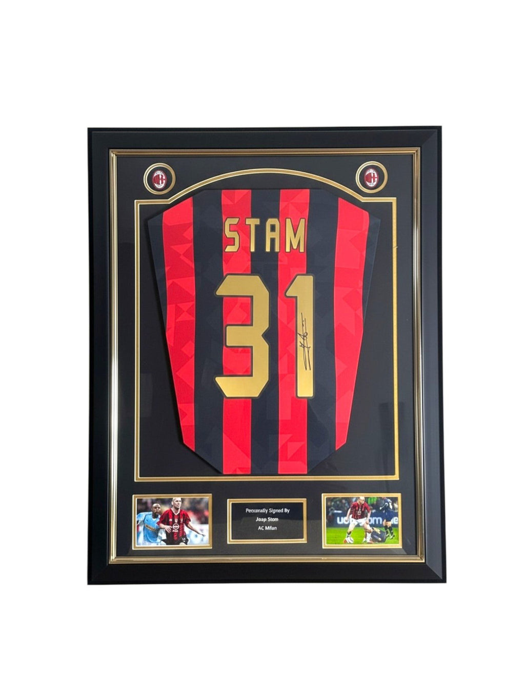 Framed Jaap Stam signed AC Milan 1988 replica number 31 football shirt with two photos and a central plaque.