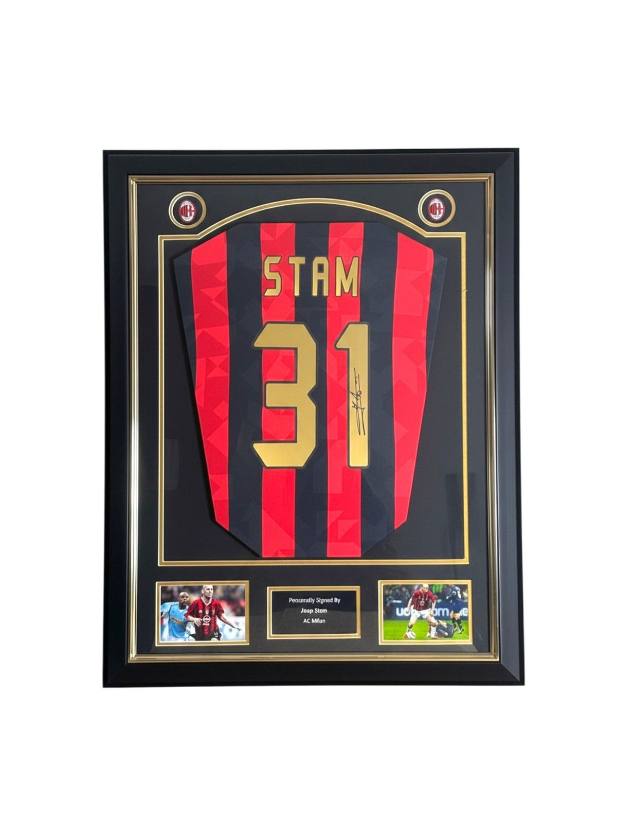 Framed Jaap Stam signed AC Milan 1988 replica number 31 football shirt with two photos and a central plaque.