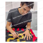 Signing proof of Kaká signing an official AC Milan football shirt during a private signing session.