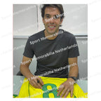Signing proof of Kaká signing an official Brazil 2004-06 football shirt during a private signing session.