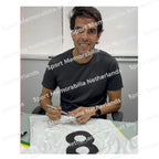 Signing proof of Kaká signing an official Real Madrid football shirt during a private signing session.