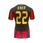Back of a black AC Milan number 22 football shirt signed by Kaka.