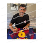 Signing proof of Luis Suárez signing an official Barcelona 2025-26 football shirt during a private signing session.