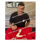 Signing proof of Luis Suárez signing an official Liverpool football shirt during a private signing session.