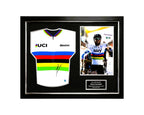 Framed official UCI World Champion rainbow jersey signed by Mark Cavendish, professionally displayed with one action photo.