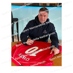 Signing proof of Michael Owen signing an official Liverpool 2000-02 football shirt during a private signing session.