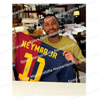Signing proof of Neymar da Silva Santos Júnior with a signed Barcelona football shirt.