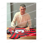 Signing proof of Paolo Maldini signing an official AC Milan 1988 football shirt during a private signing session.