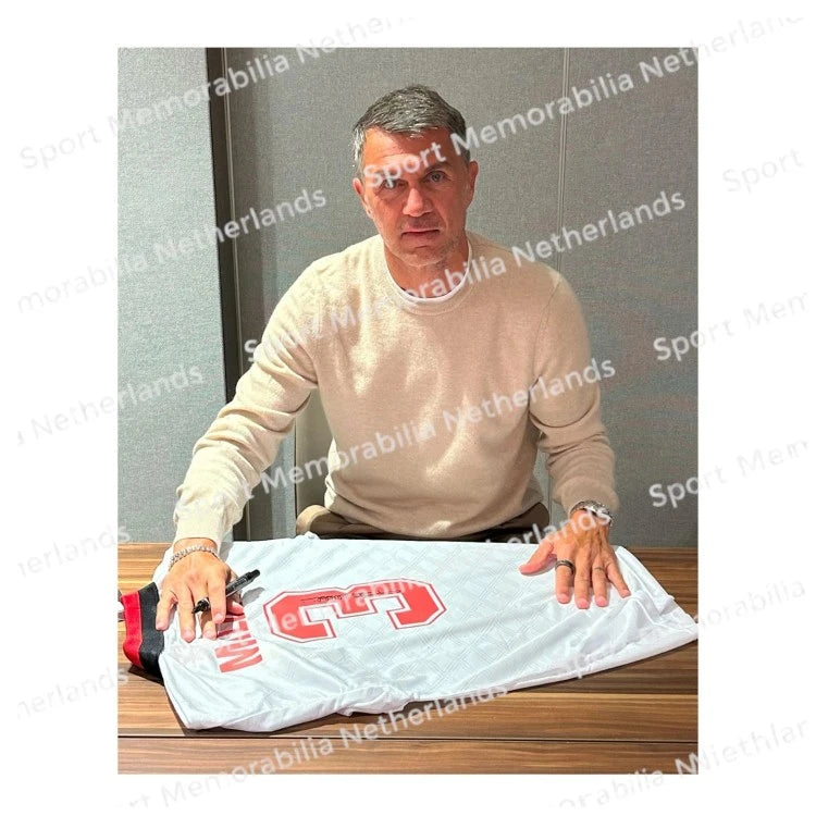 Signing proof of Paolo Maldini signing an AC Milan 1994 European Cup final shirt during a private signing session.