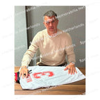Signing proof of Paolo Maldini signing an AC Milan 1994 European Cup final shirt during a private signing session.