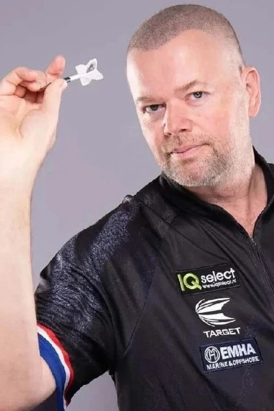 Raymond van Barneveld throwing a dart in his Target darts shirt.
