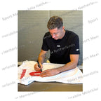 Signing proof of Robert Lewandowski signing an official Poland 2008 football shirt during a private signing session.