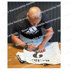 Signing proof of Roberto Carlos signing an official Real Madrid 2024-25 football shirt during a private signing session.
