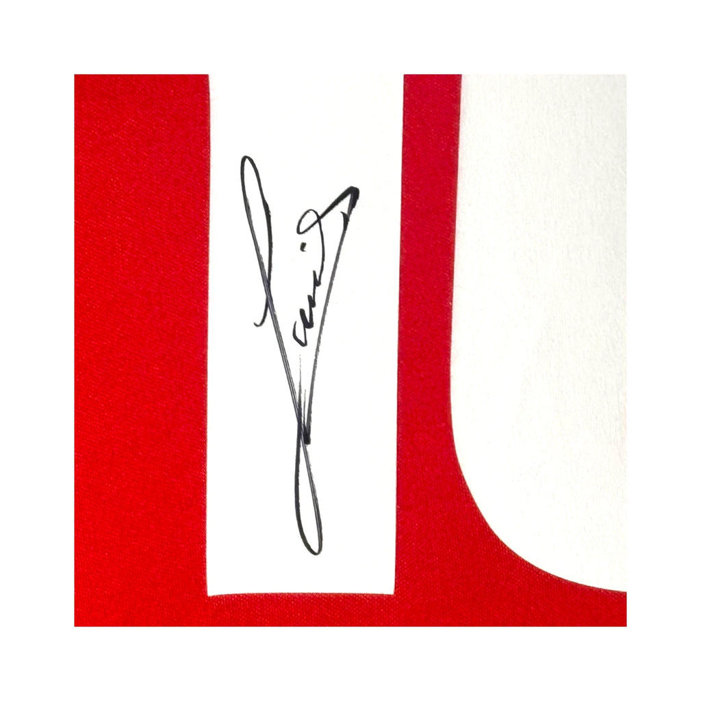 Detailfoto van de handtekening van Ruud Gullit op een PSV 1986 replica nummer 10 voetbalshirt.