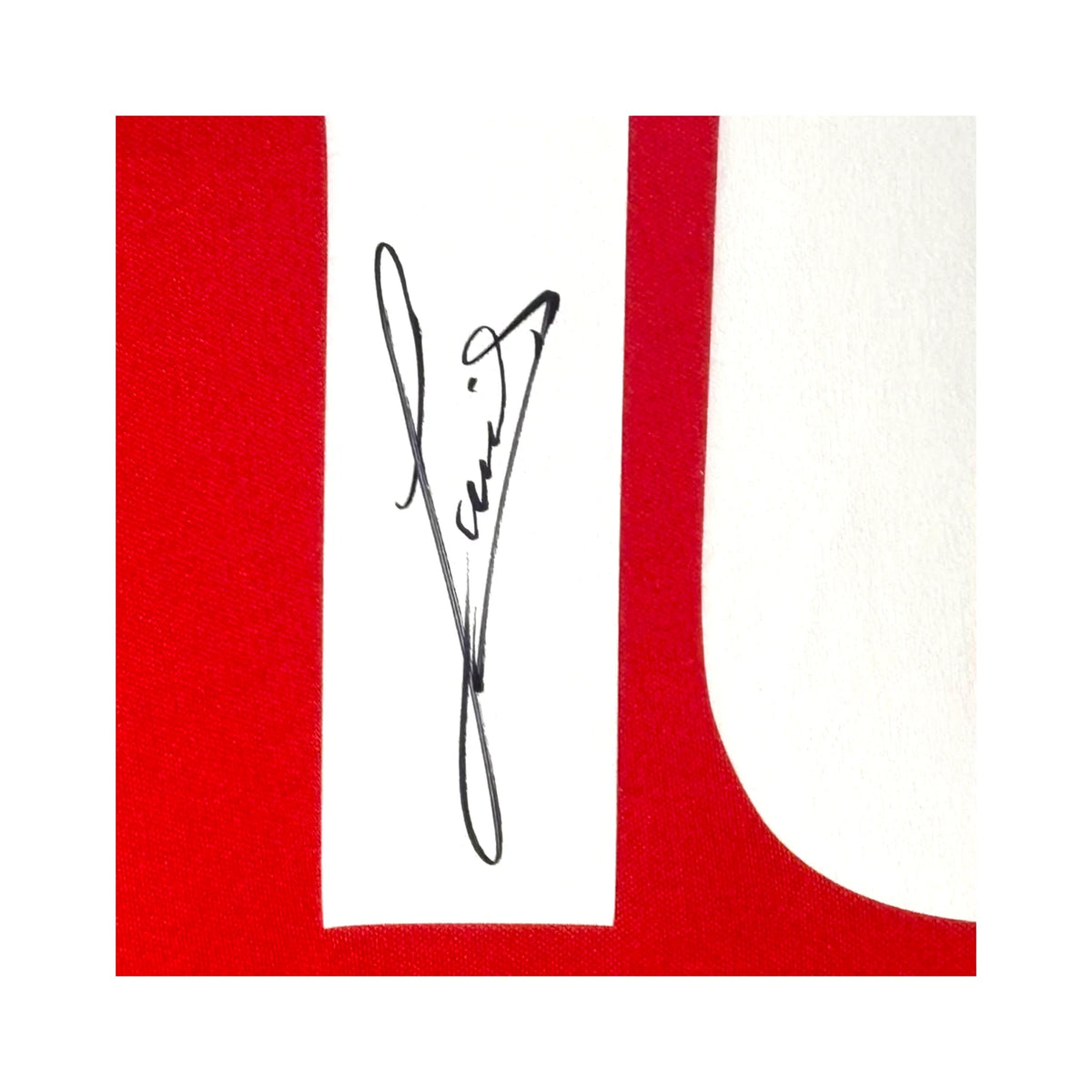 Detailfoto van de handtekening van Ruud Gullit op een PSV 1986 replica nummer 10 voetbalshirt.