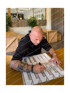 Wesley Sneijder signing authenticity labels during a private Sport Memorabilia Netherlands signing session.