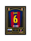 Xavi Hernandez signed FC Barcelona football shirt number 6 displayed in a black and gold presentation frame.