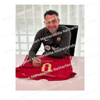 Signing proof of Xavi Hernández signing an official Spain 2014-15 football shirt during a private signing session.